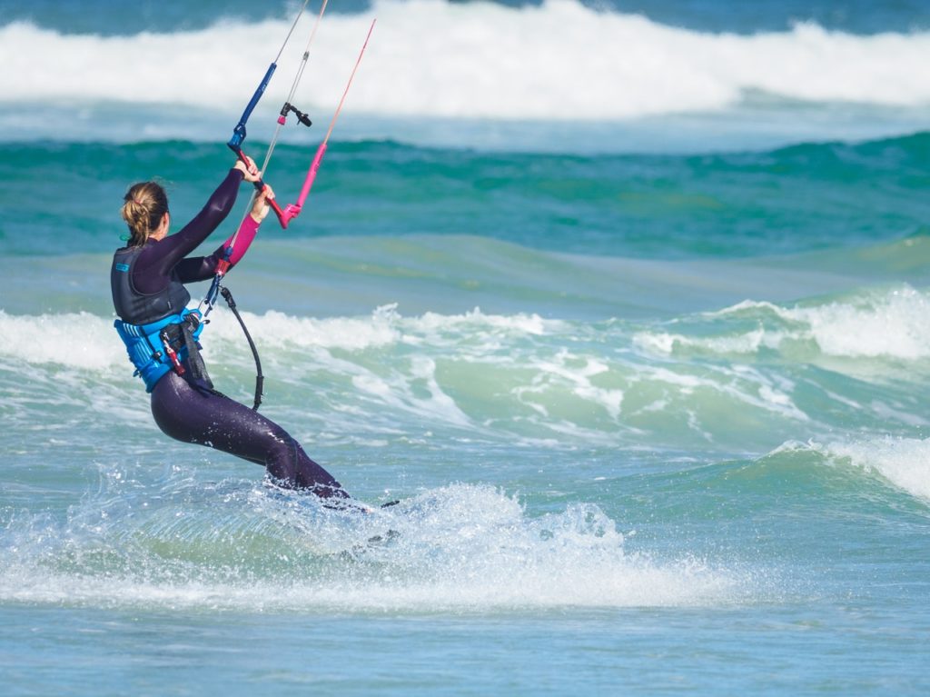 woman kite surfing